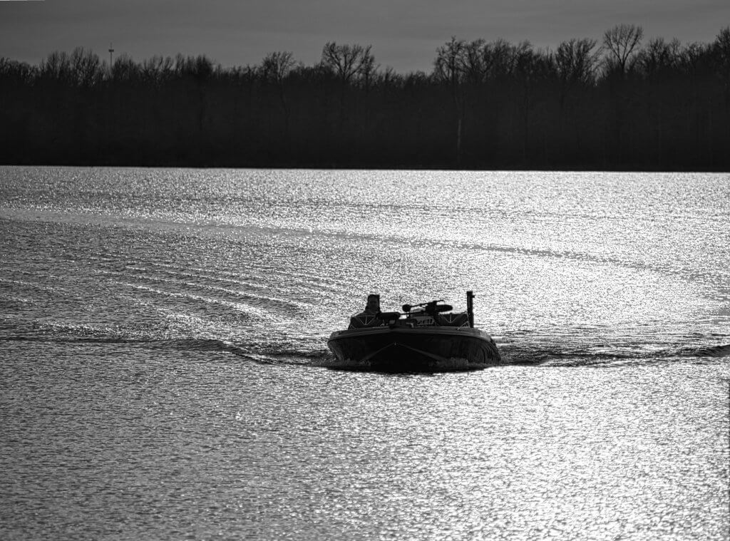 Fisherman in bass boat on Lake Fork